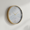 שעון קיר עדין מסגרת זהב